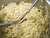spaghetti-pie-mixing-noodles.jpg